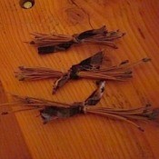 Pine needle bunches tied with fabric.