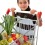 Young Boy Pushing Shopping Cart