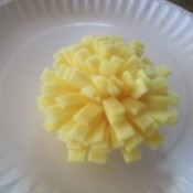 Finished bow, resembling a pom pom.