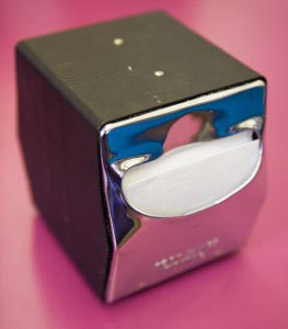 A napkin dispenser.