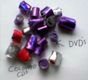 Beads made from rolled CD pieces.