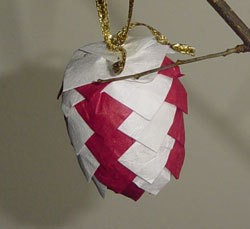 Finished red and white paper pinecone.