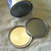 Frozen juice can and lid.