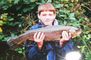 Boy with a large fish.