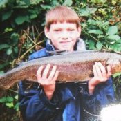 Boy with a large fish.