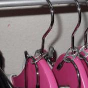 Hang another on an existing hanger using a pop can tab.