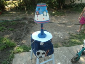 The finished nightstand from a wooden stool.