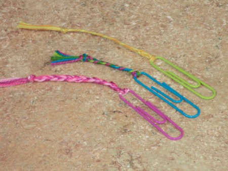 Pink, blue, and yellow examples of bookmarks.