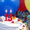 Cake with a 13 candles on it.