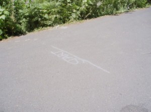 Chalk start line on sidewalk.