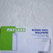 Textured paintable wallpaper with label in place.