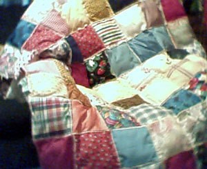 Stuffed square quilt.