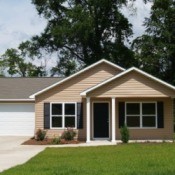 Photo of a house with vinyl siding.