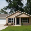 Photo of a house with vinyl siding.