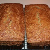 2 loaves of zucchini bread cooling on rack