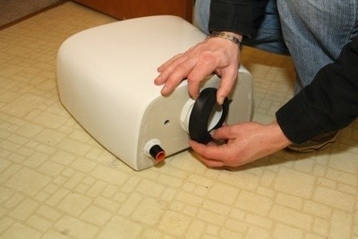 Place Rubber Gasket for New Toilet Tank