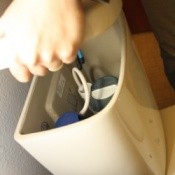 Place New Tank Lid