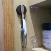 Attach a magnet to store tweezers