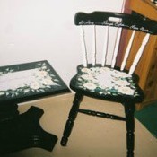 Painted table and chair recycled for use as plant stands. 