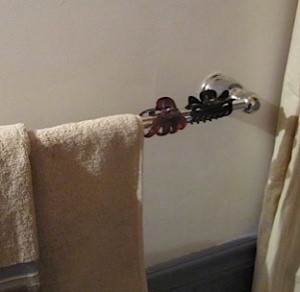 Hair clips on towel bar.