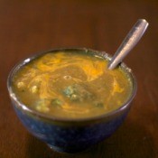 A bowl of broccoli leek soup with cheese