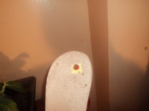 Bottom of flip flop with tag.
