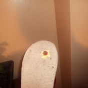 Bottom of flip flop with tag.