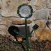 Recycled materials make a garden flower.