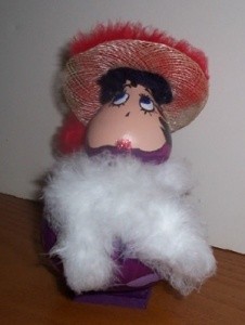 Gourd painted and decorated to look like Betty Boop.