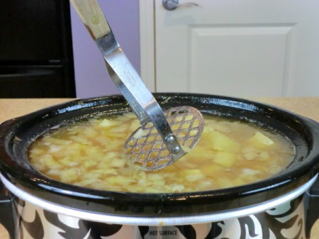 mashing the potatoes