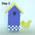Decoratively painted house and bird.