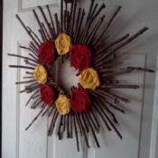 Stick wreath hanging on the front door.