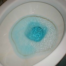 How do you clean a badly stained toilet bowl?