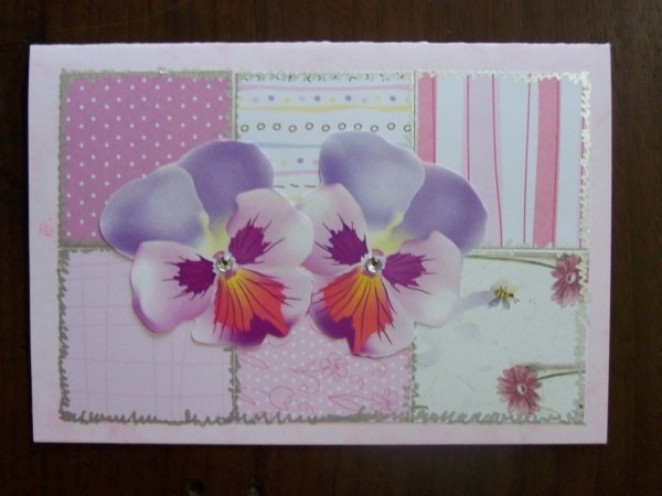 Special occasion card with pink patchwork pink squares and pansies.

