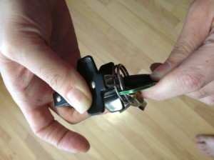 Separating keyring with staple puller. 