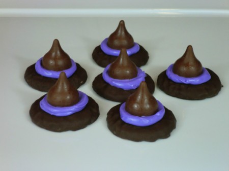 Photo of finished witch hats made from Oreos and Hershey's kisses.