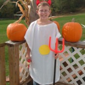 Boy in deviled egg costume.