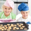 Young Boy and Girl Baking Cookies