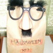 Brown paper bag kit with fun glasses.
