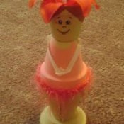 Cute ballerina made from clay flower pots.
