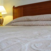 Photo of a bed with a memory foam mattress.