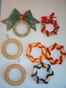Shower curtain rings decorated as Christmas ornaments.