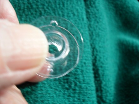 Closeup of sewing machine bobbin.