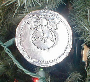 Aluminum ornament made from a pie pan