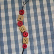 Joy Ornament made from Scrabble pieces