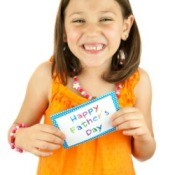 Girl with Homemade Father's Day Card
