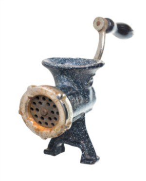 A rusty meat grinder.