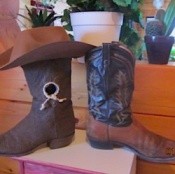 Cowboy boot used to make birdhouse.