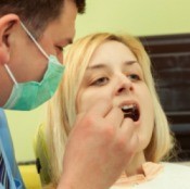 A woman getting dental work done.
