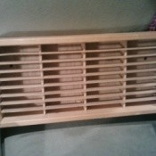 Wooden cassette tape holder.